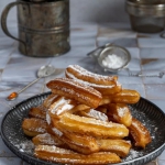 Churros z cukrem pudrem